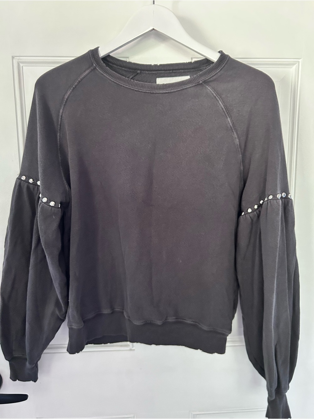 THE GREAT. Washed Charcoal Puff Sleeve Crewneck Sweatshirt with Rhinestone Trim